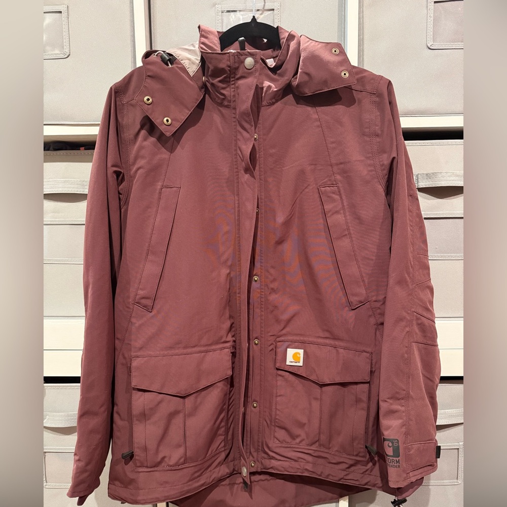 Carhartt women’s Burgundy storm defender Jacket size medium.